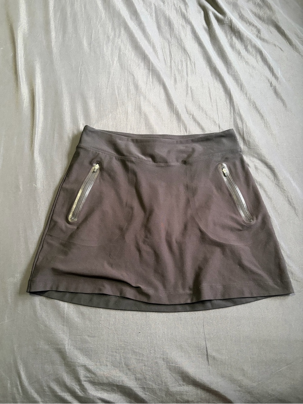 Black Nike Golf Tour Performance Skort w/side and back pockets. Size Medium.